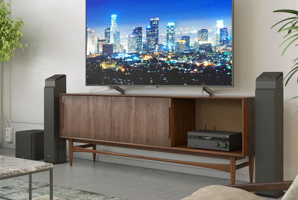 floor-standing speakers in home theater setup